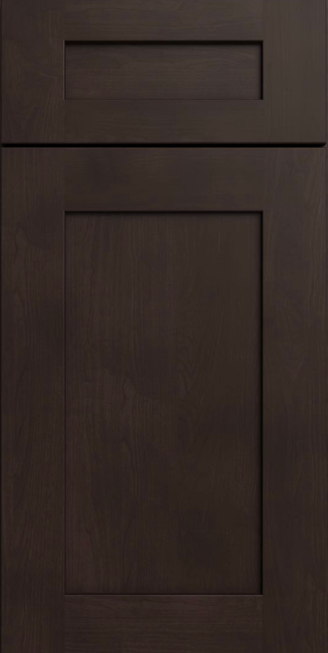 Dark brown paneled cabinet door with a small top drawer