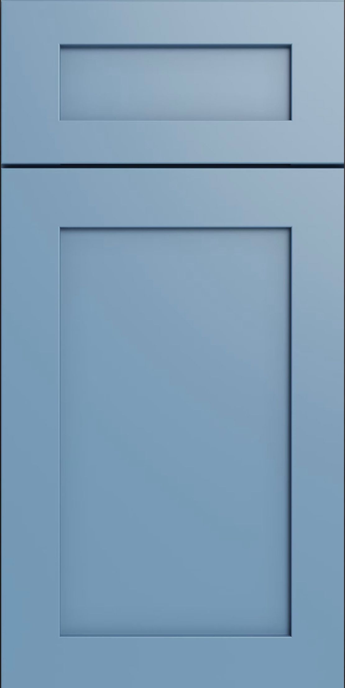 Blue paneled cabinet door with a small top drawer and a larger lower panel