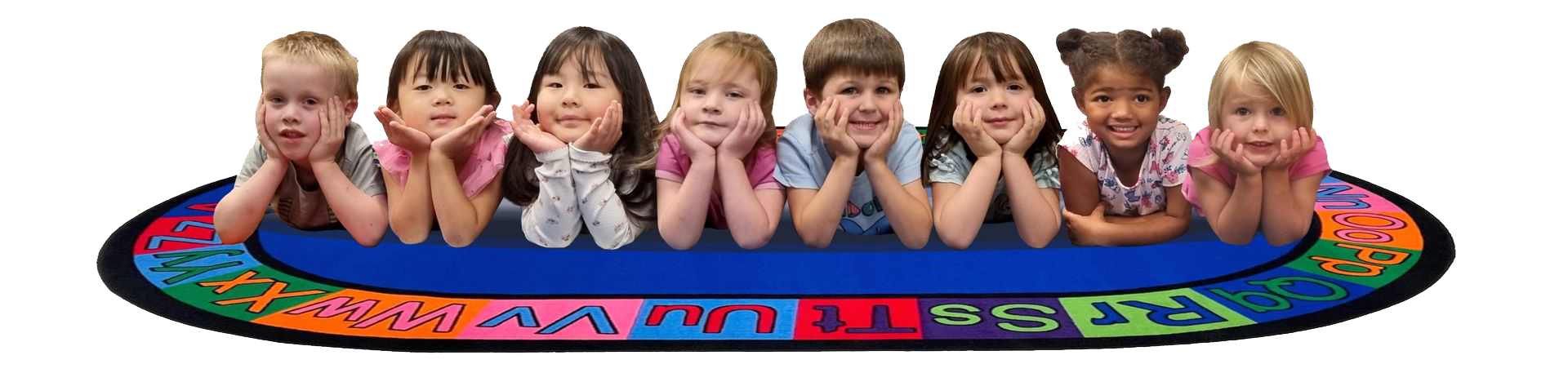 Seven smiling children leaning on colorful toy blocks in a row on a white background