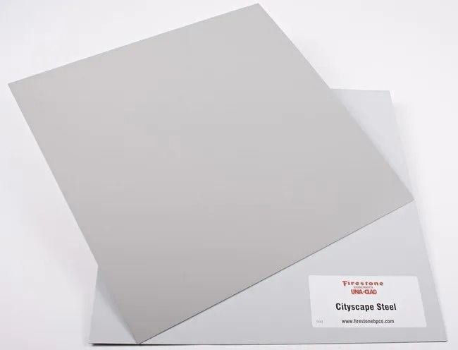 Gray envelope with a small white address label on a light background