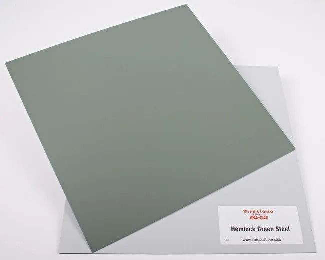 Muted green square sheet on a white background with a small label card in the lower right.