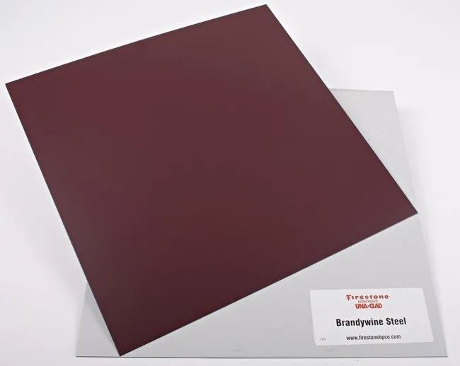 Maroon square board with a small label on a white background