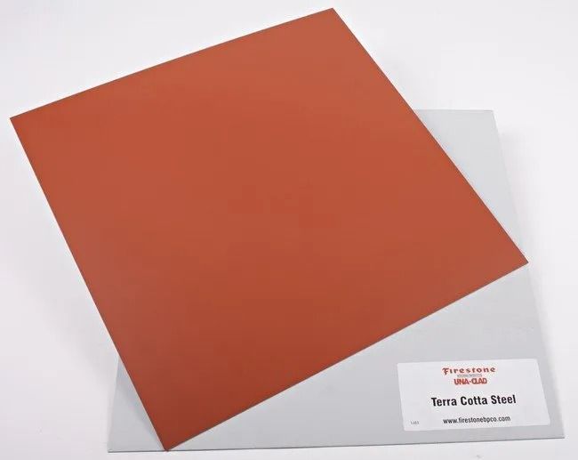 Orange square card on a white backing sheet with a small printed label in the bottom right