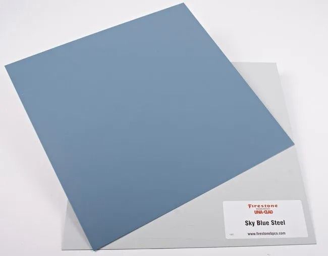 Blue square placemat or paper on a white background with a small label in the corner