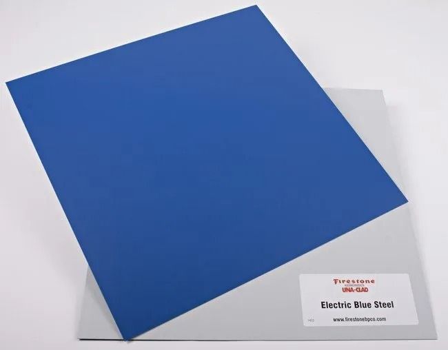 Blue metal sheet on a white background with a small label reading
