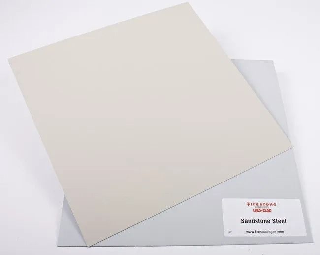 Two stacked sheet samples, cream and light gray, with a small product label in the corner.