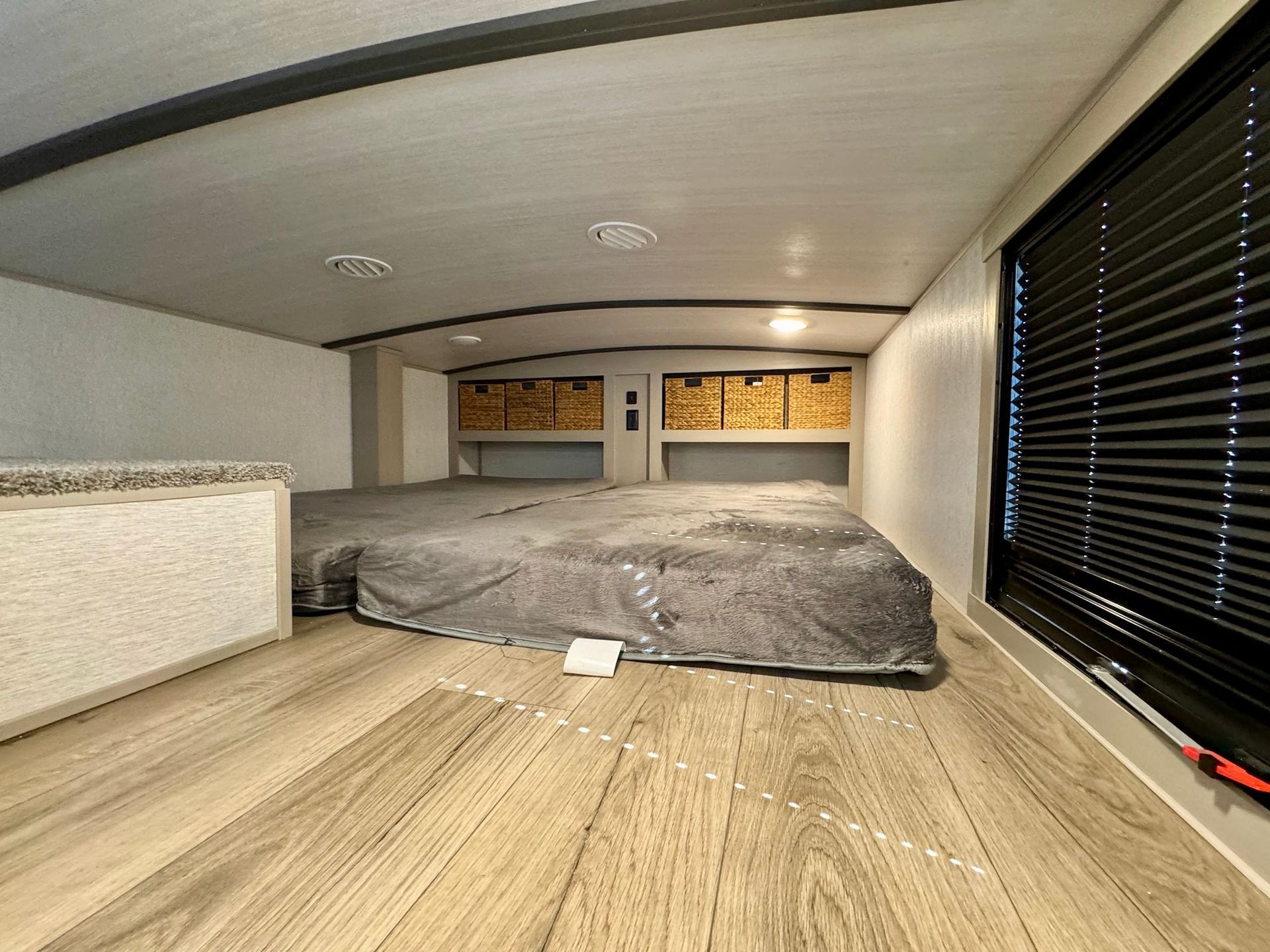 There is a bed in the middle of the room.