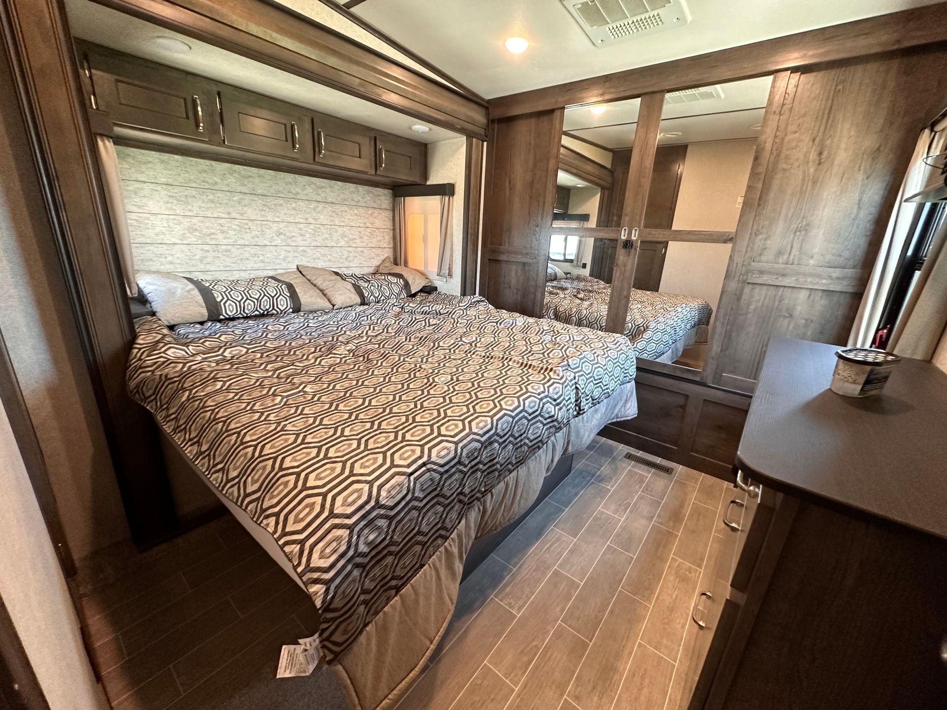 There is a large bed in the middle of the room.