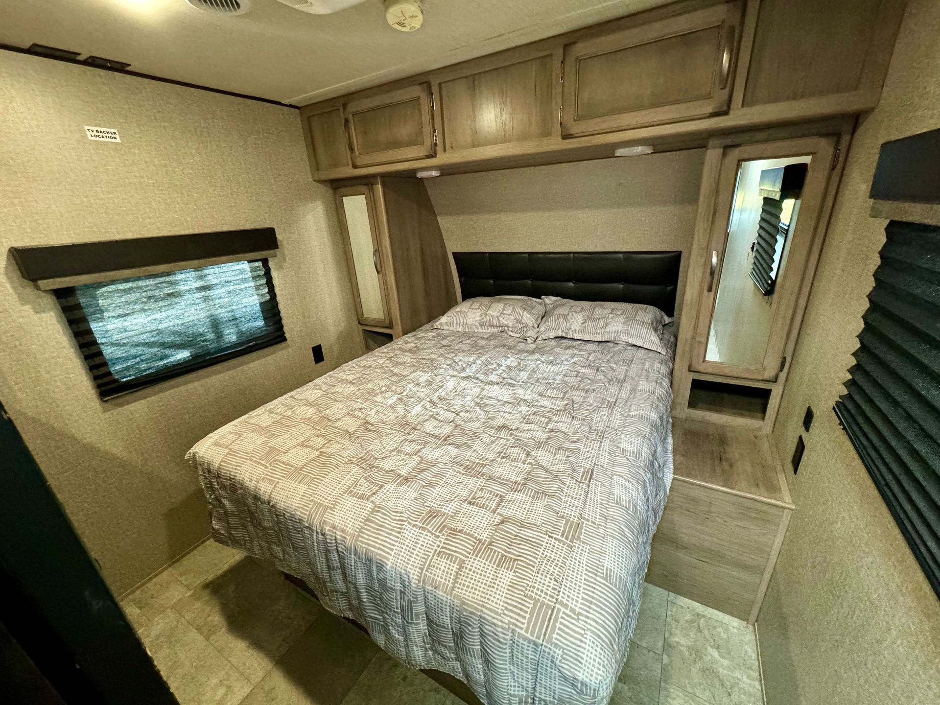 There is a large bed in the middle of the room.