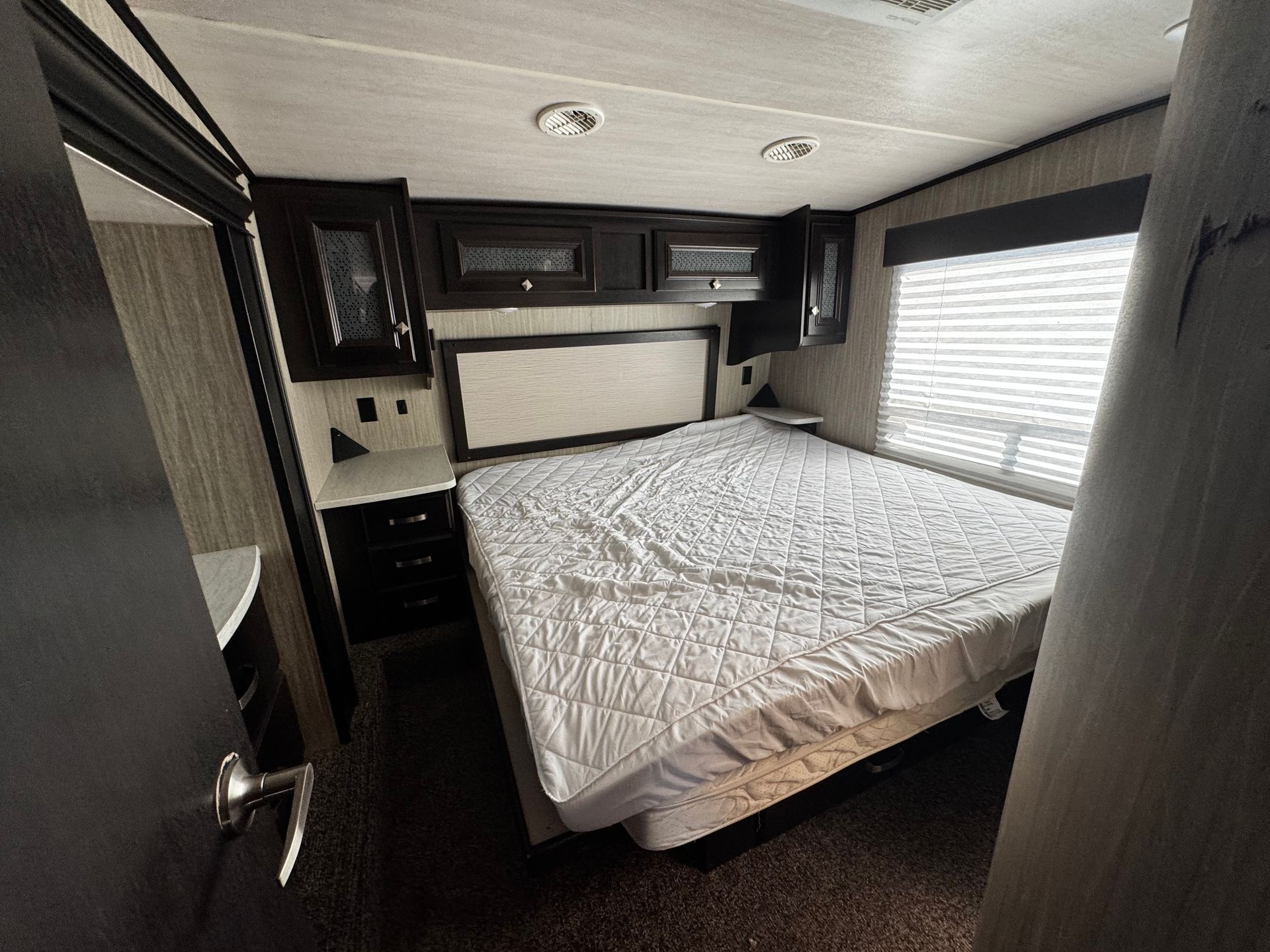 There is a large bed in the middle of the room.