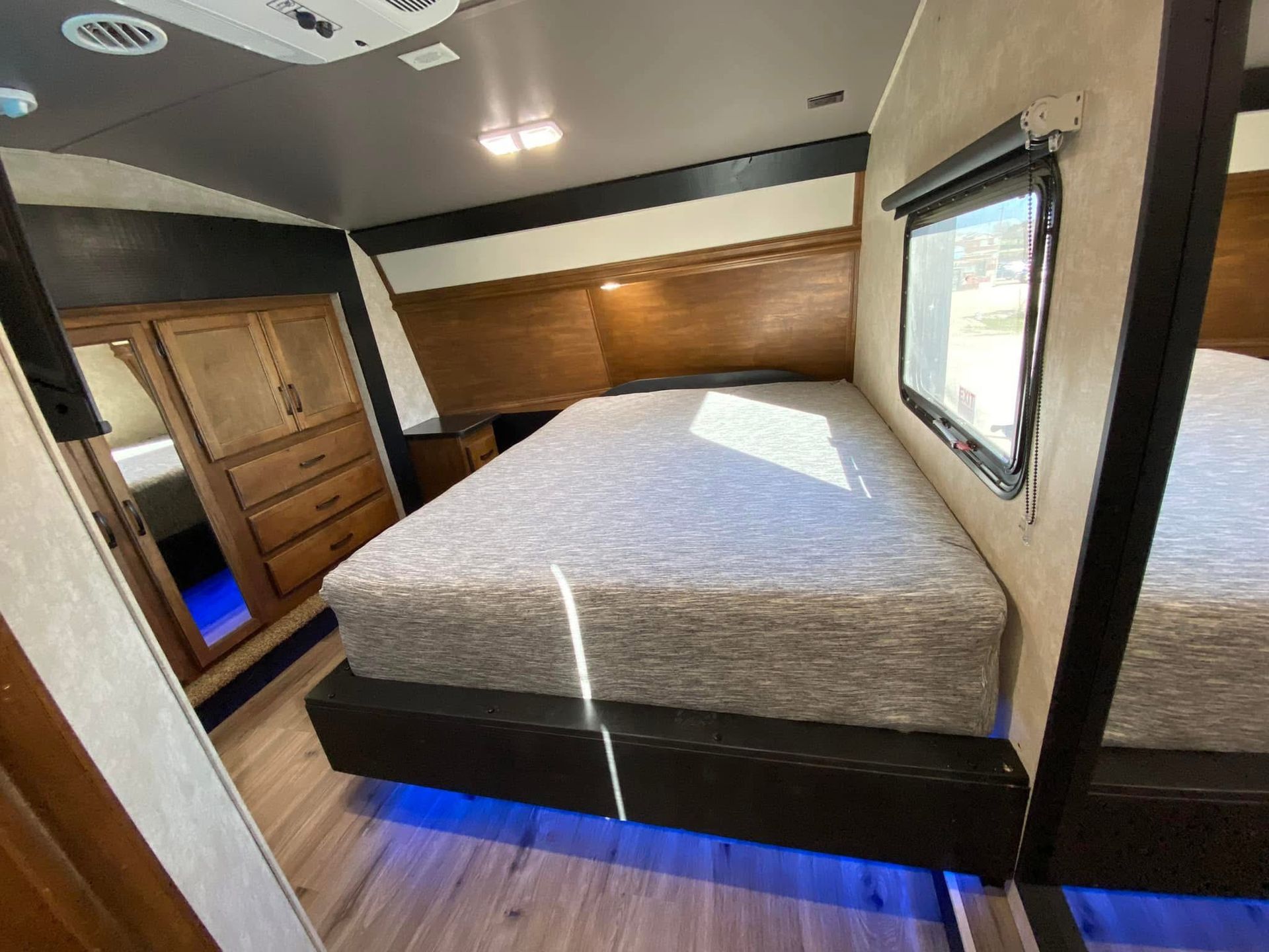 There is a bed in the middle of the room.