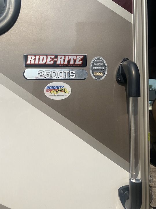 A sticker on the side of a rv that says ride-rite 2500ts