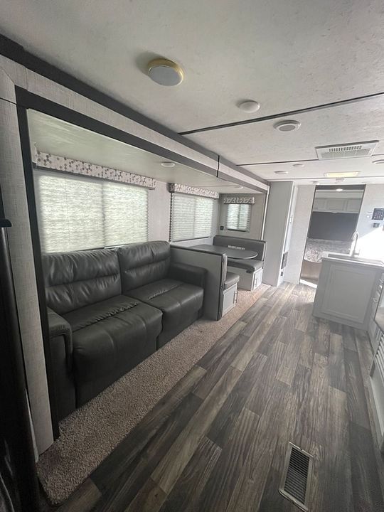 There is a couch in the middle of the room.