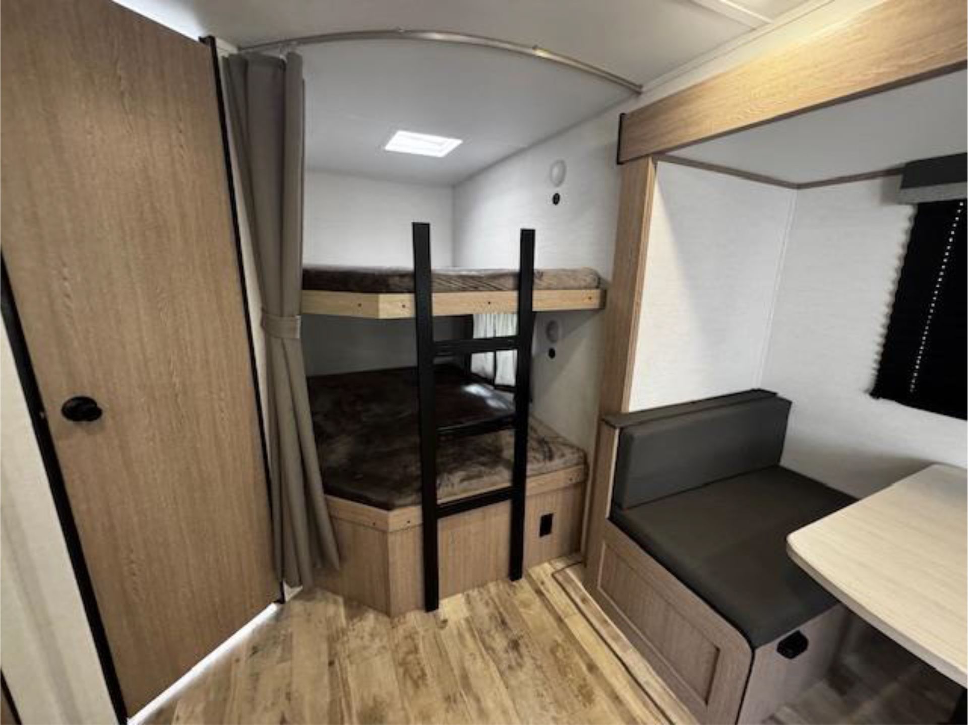 There is a bunk bed in the middle of the room