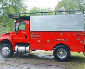 A red truck with the number on the side