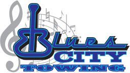 Blue guitar with music notes, "Blues City Towing" logo in blue and white.