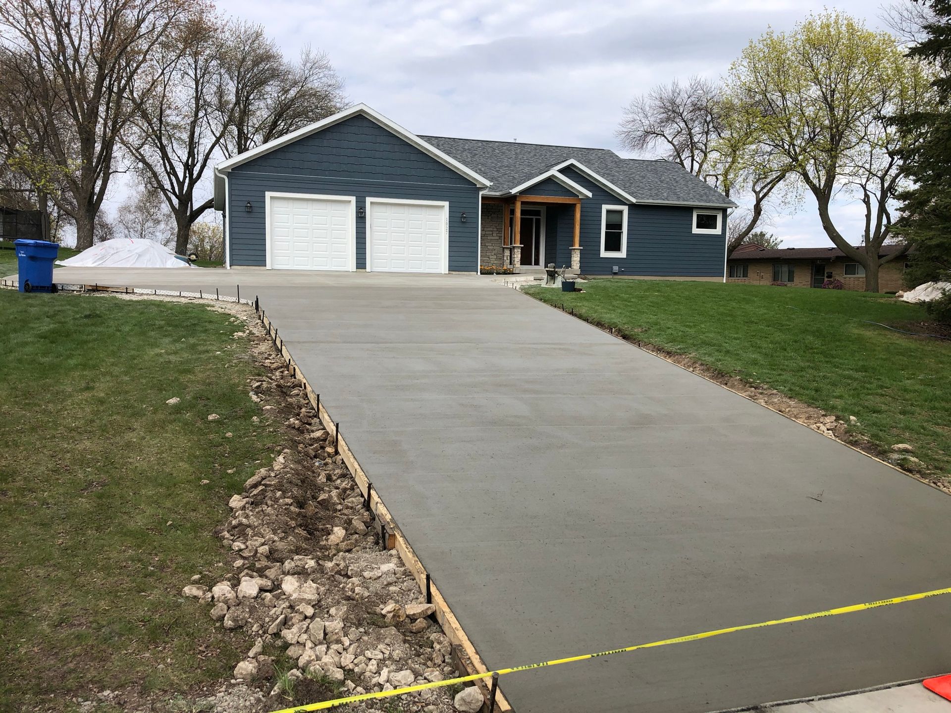 Garage with concrete driveway