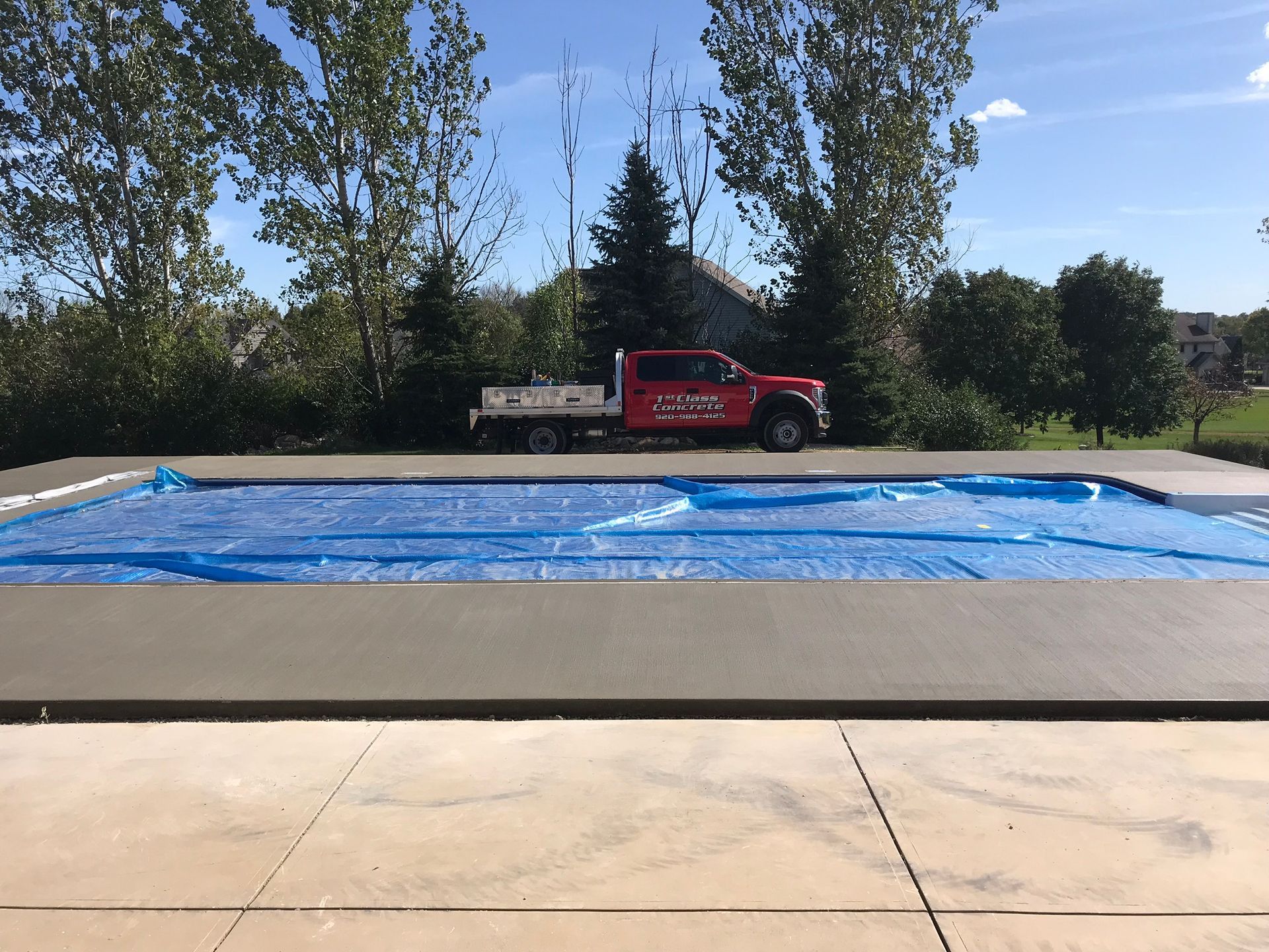 Concrete swimming pool side
