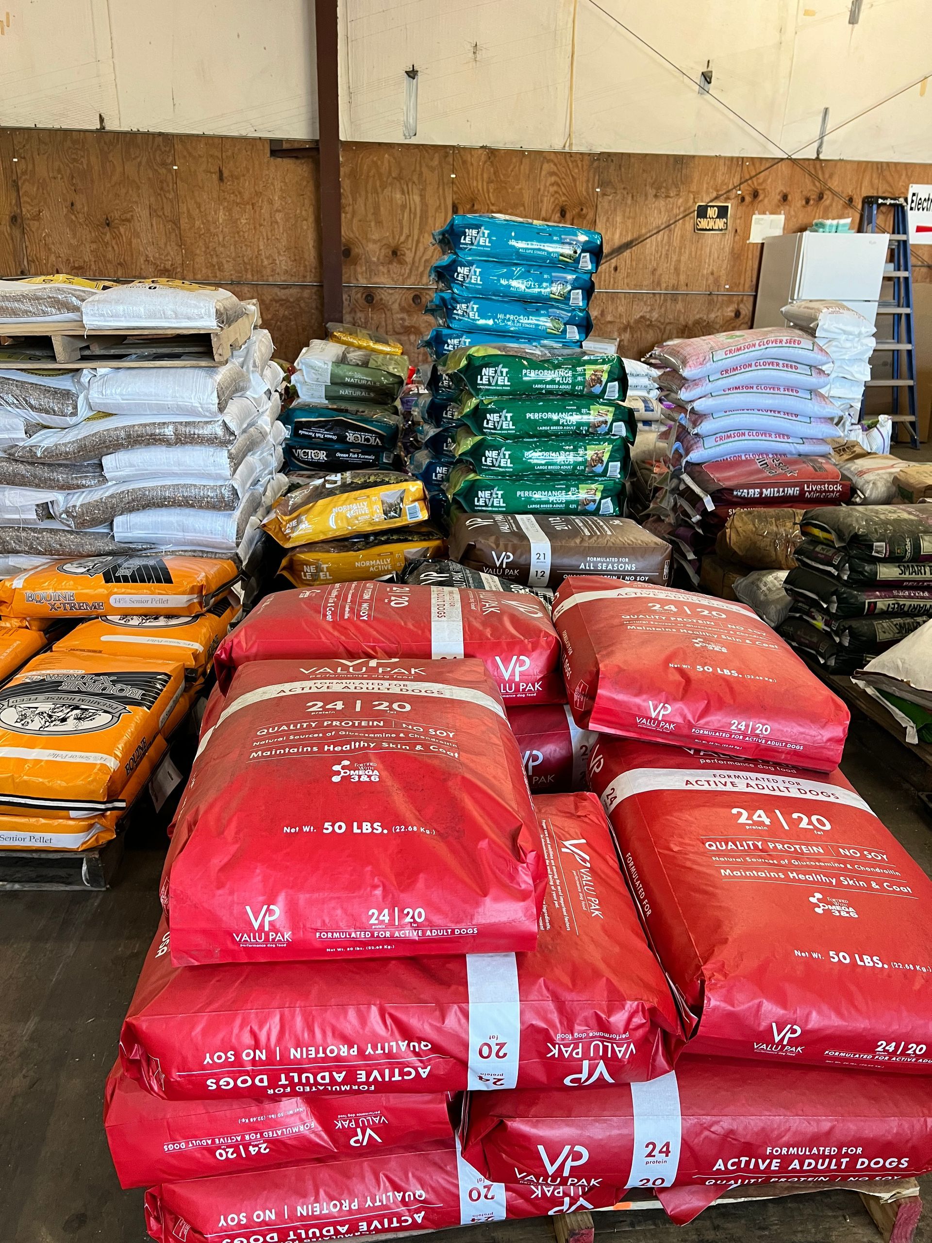A warehouse filled with lots of bags of food.