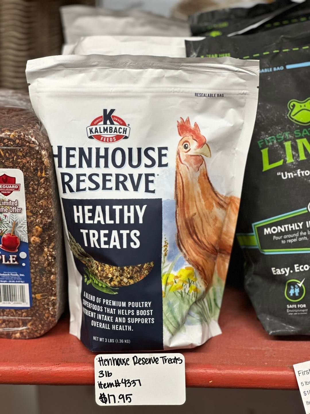 A bag of henhouse reserve healthy treats is sitting on a shelf.