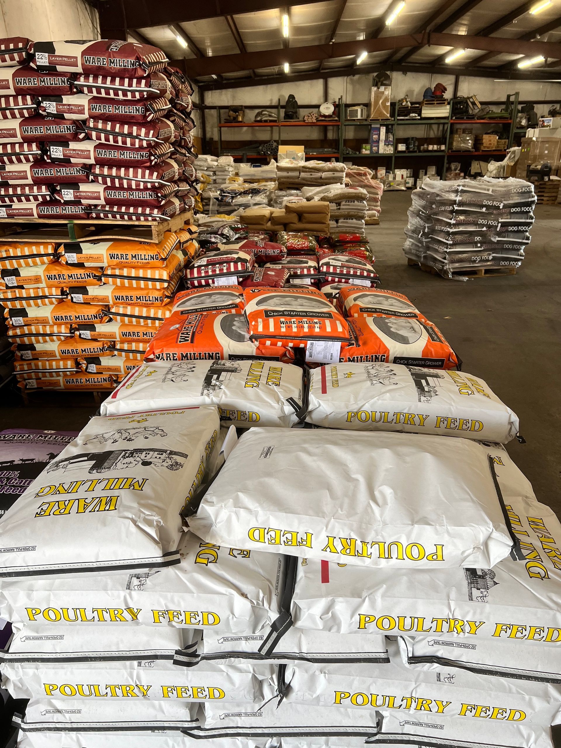 A warehouse filled with lots of bags of dog food
