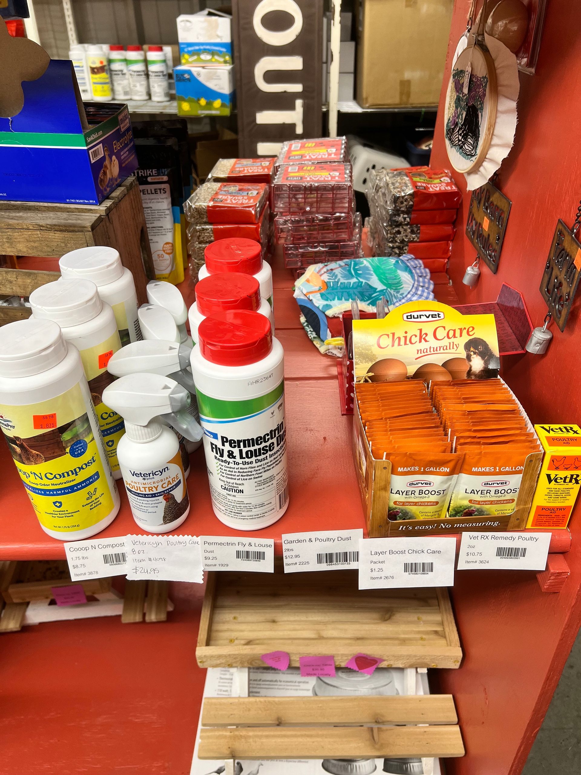 A shelf in a store filled with lots of bottles and boxes.