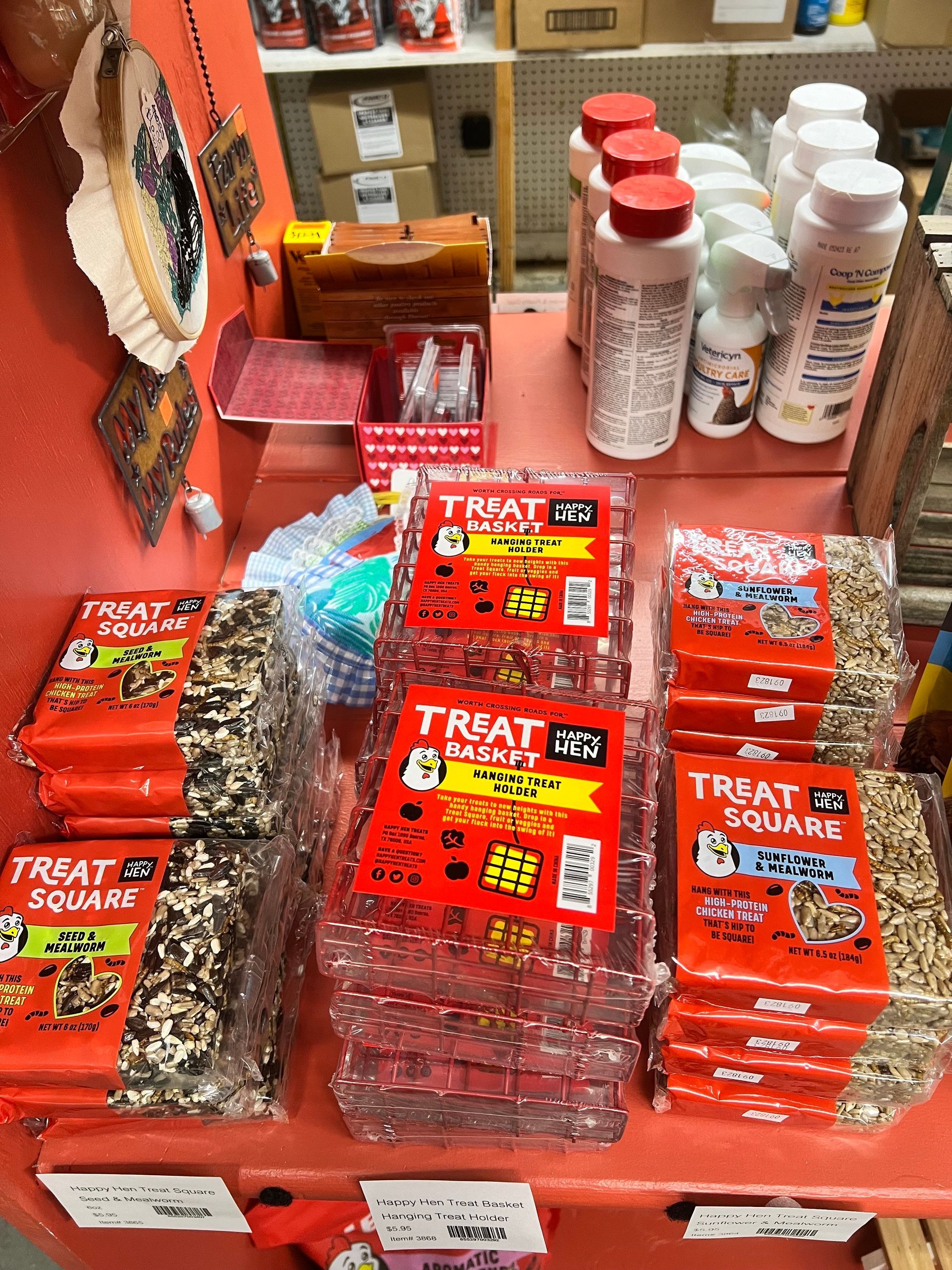 A shelf filled with lots of treats for dogs and cats.