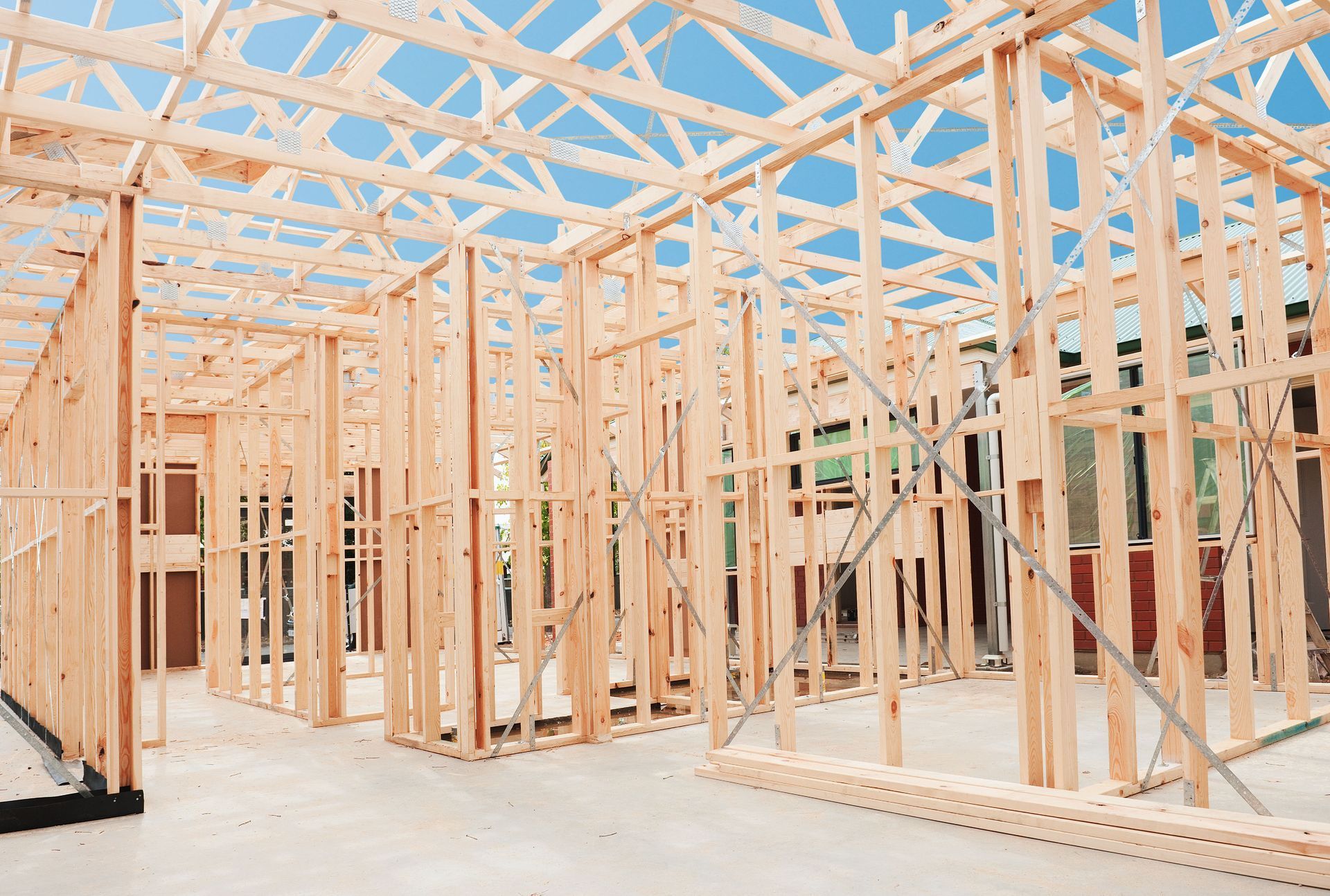 Wooden frame of a house under construction; interior view.