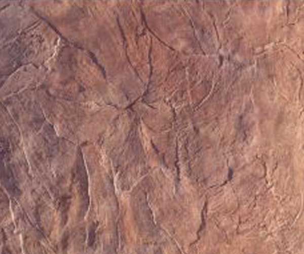 A close up of a brown stone wall texture.