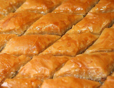 A close up of a baklava sitting on top of a table.
