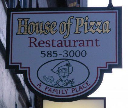 A sign for the house of pizza restaurant