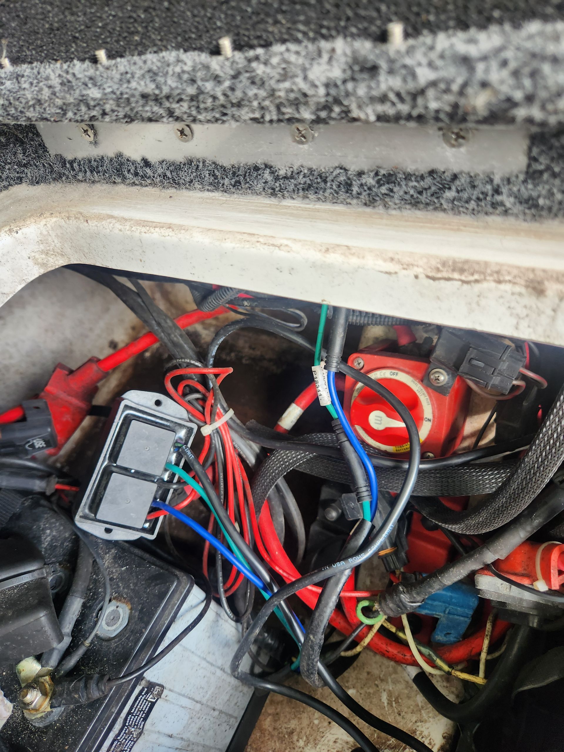 A boat with a lot of wires coming out of it