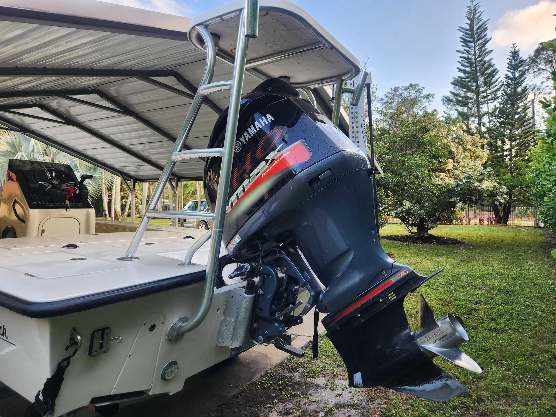 A mercury outboard motor is attached to the back of a boat