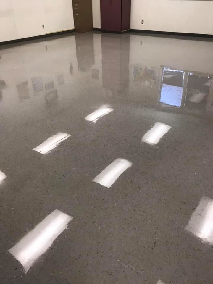 A room with a shiny floor and a lot of lights on it.