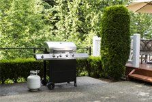 A barbecue grill with propane gas
