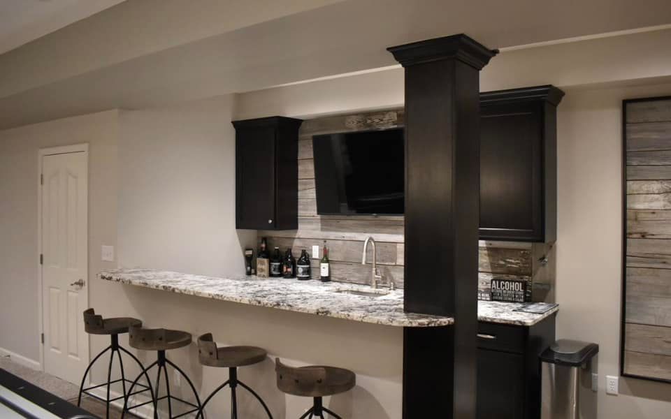 Bar area with black and white marble countertop