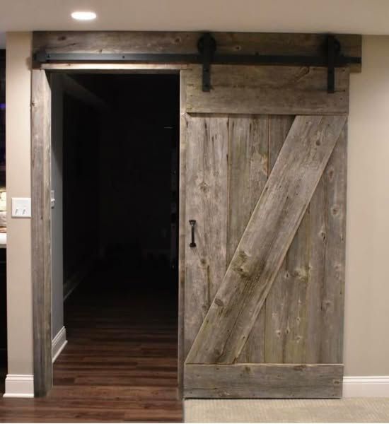 A wooden sliding barn door 