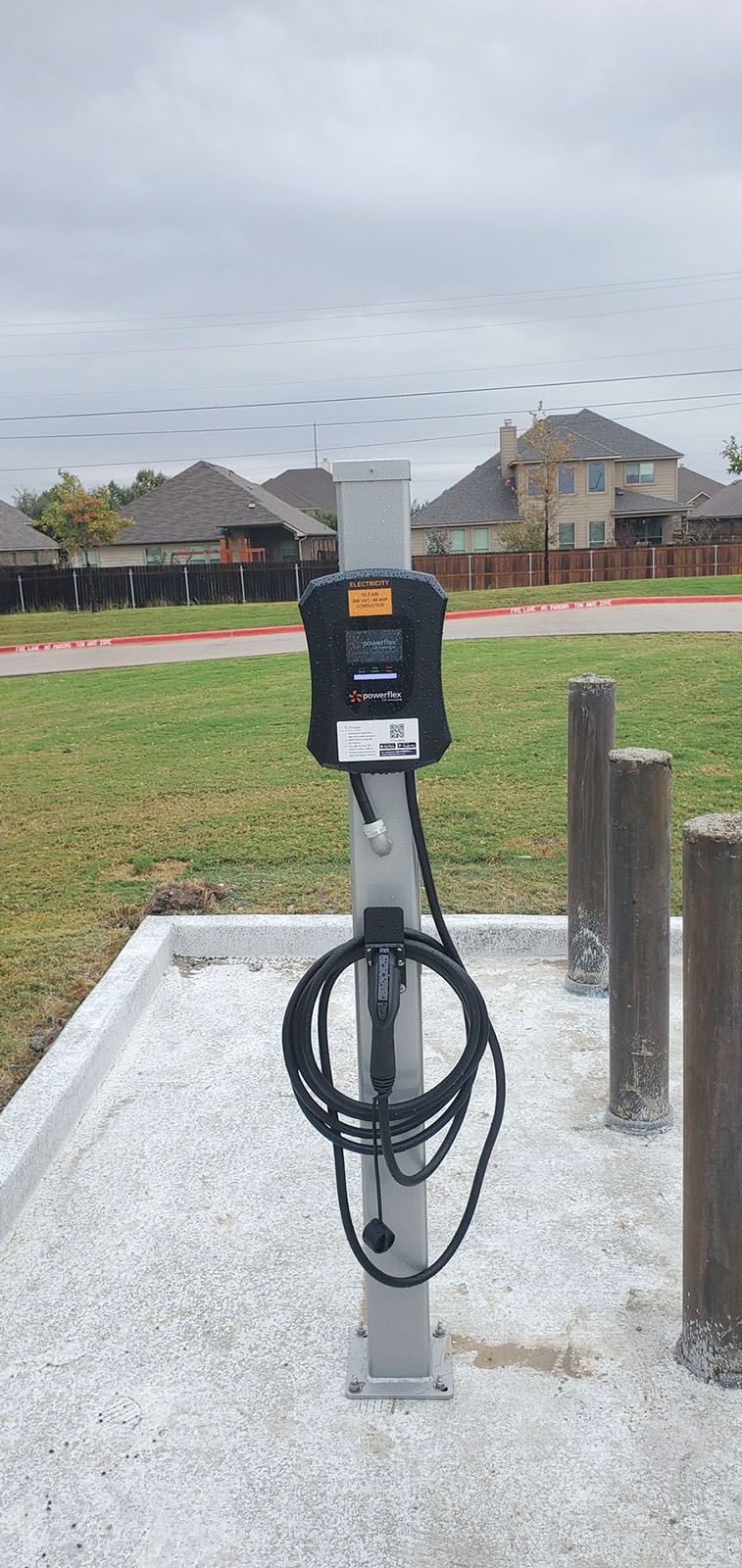 A gray electric vehicle charging station