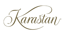 Karastan logo in elegant script; brown text on white background.