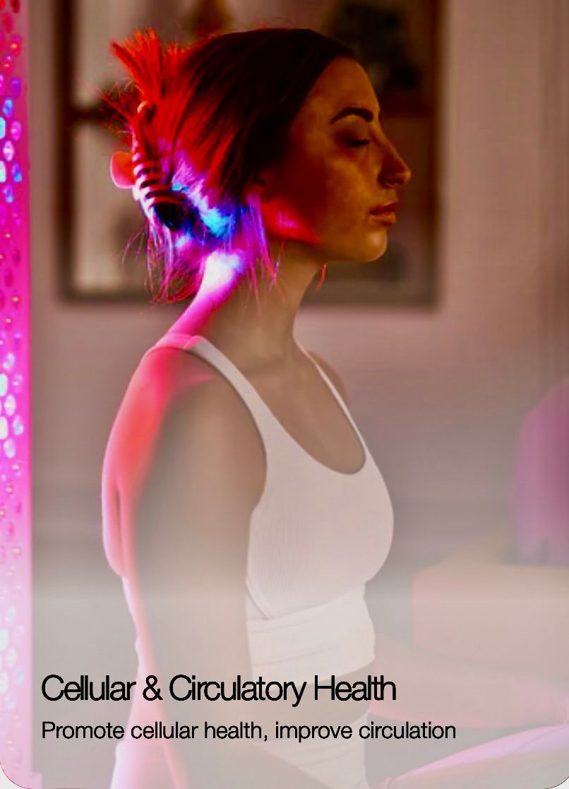 Woman in white top, receiving red and blue light therapy, promoting cellular and circulatory health.