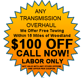 Orange starburst coupon for any transmission overhaul, offering $100 off labor only.