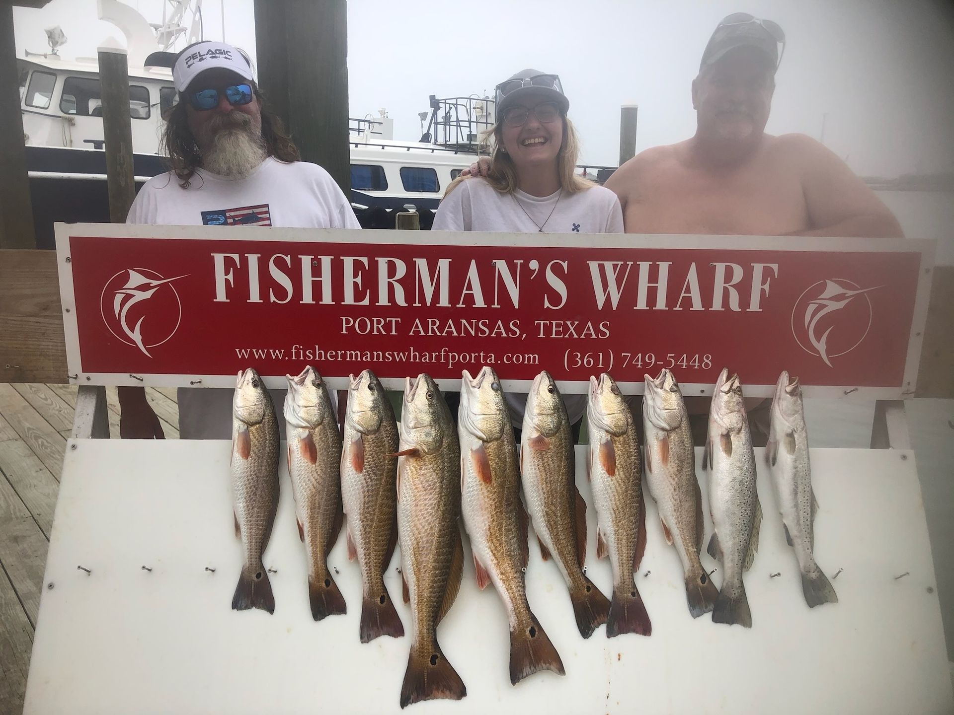 Fisherman 's wharf in fort arkansas texas is displaying a bunch of fish
