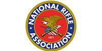 National Rifle Association circular logo with blue, red, gold, and white eagle emblem