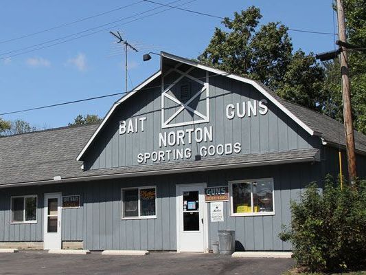 A norton sporting goods store with a barn roof