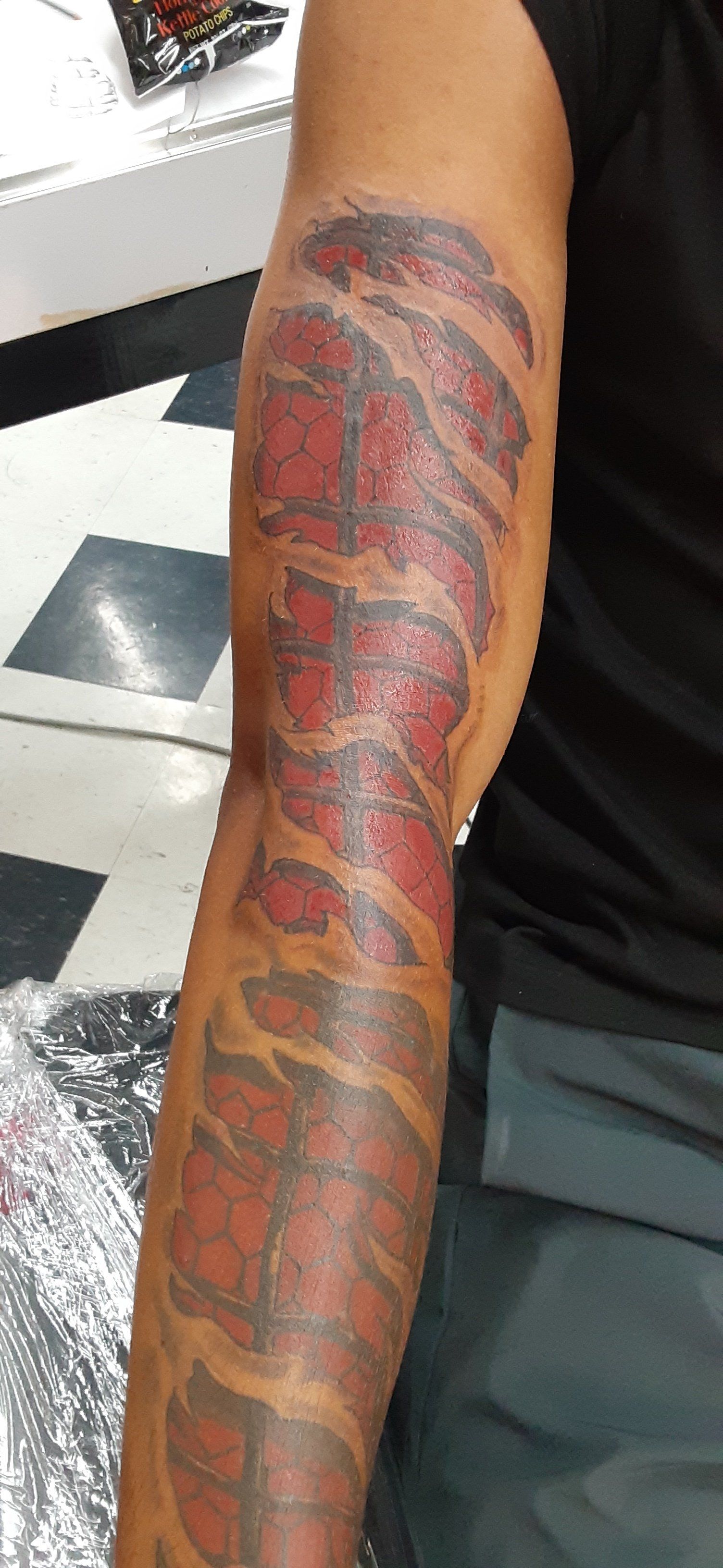 red and black tattoo