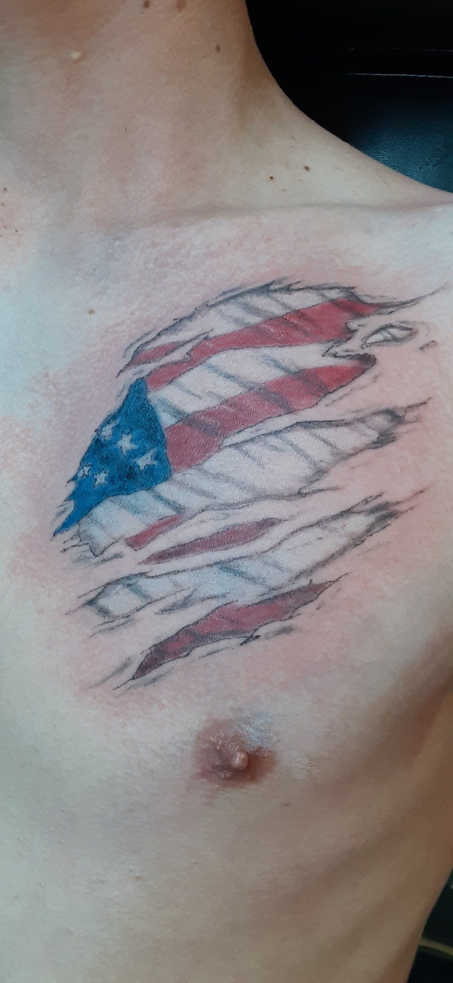 torned flag tattoo
