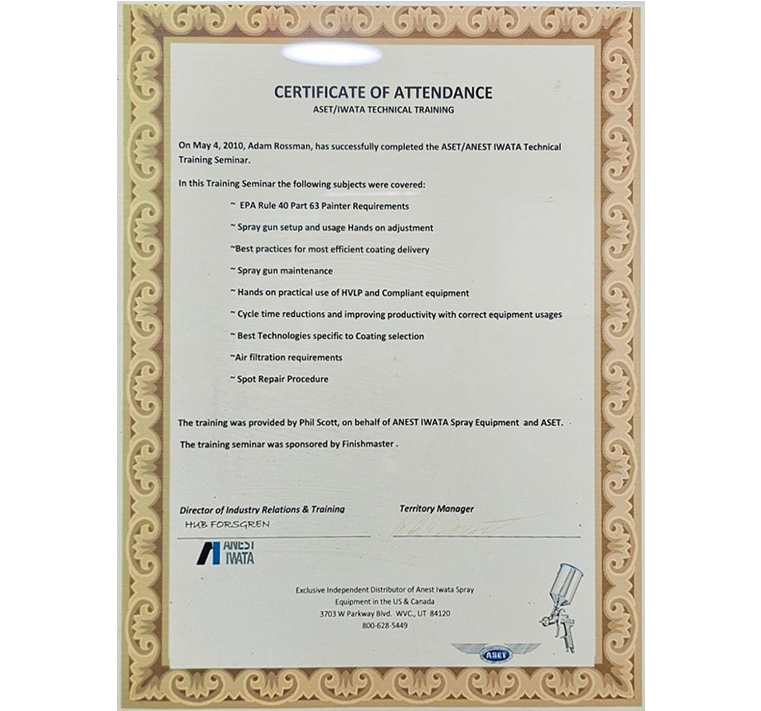 Certificate of Attendance in a frame, listing training topics and presenter signatures.