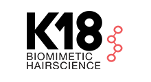 K18 Biomimetic Hairscience logo in black and pink on a white background