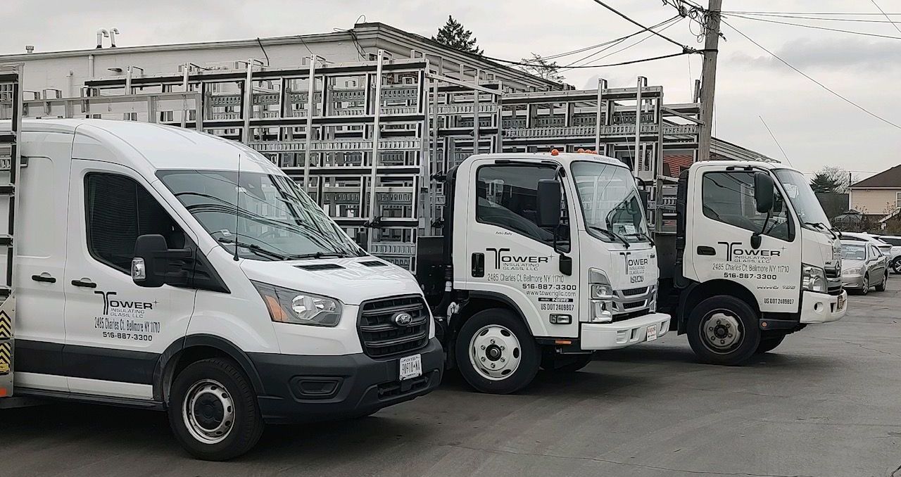 three-white-company-trucks