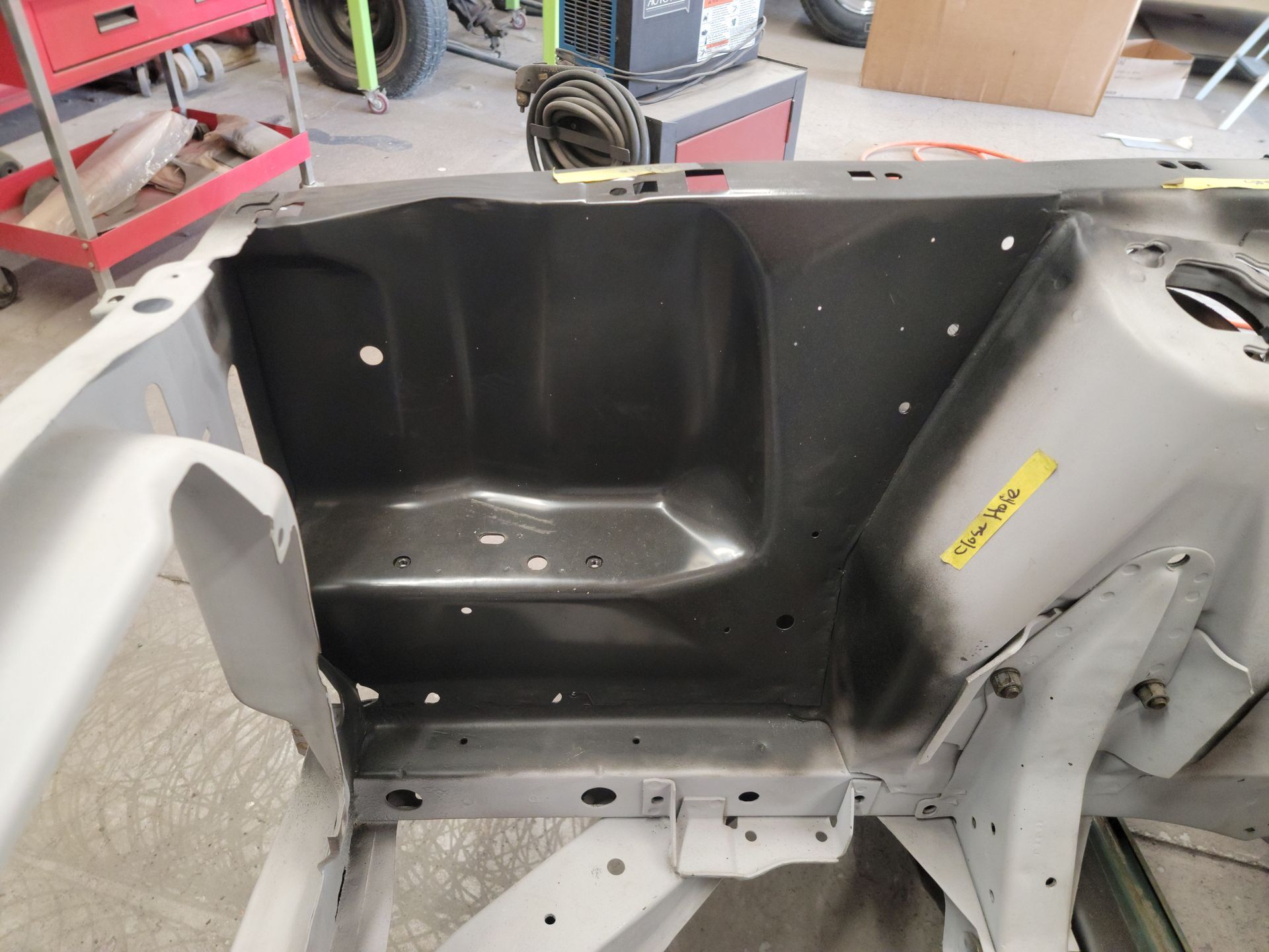 the inside of a car with a yellow sticker that says 'toyota' on it